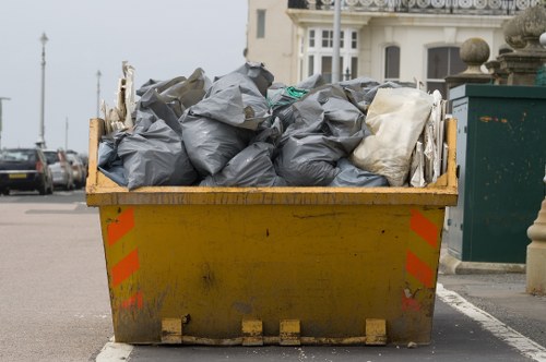 Waste clearance vehicle at a construction site