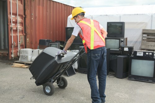 Workers sorting recyclable materials in a sustainable rubbish area