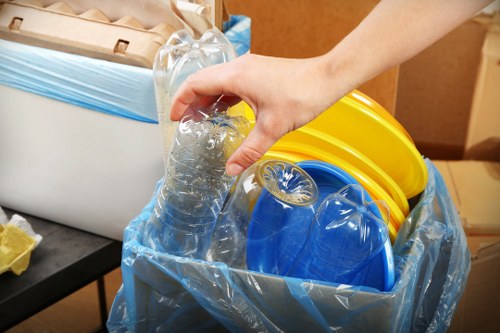 Man and van loading household items in a flat